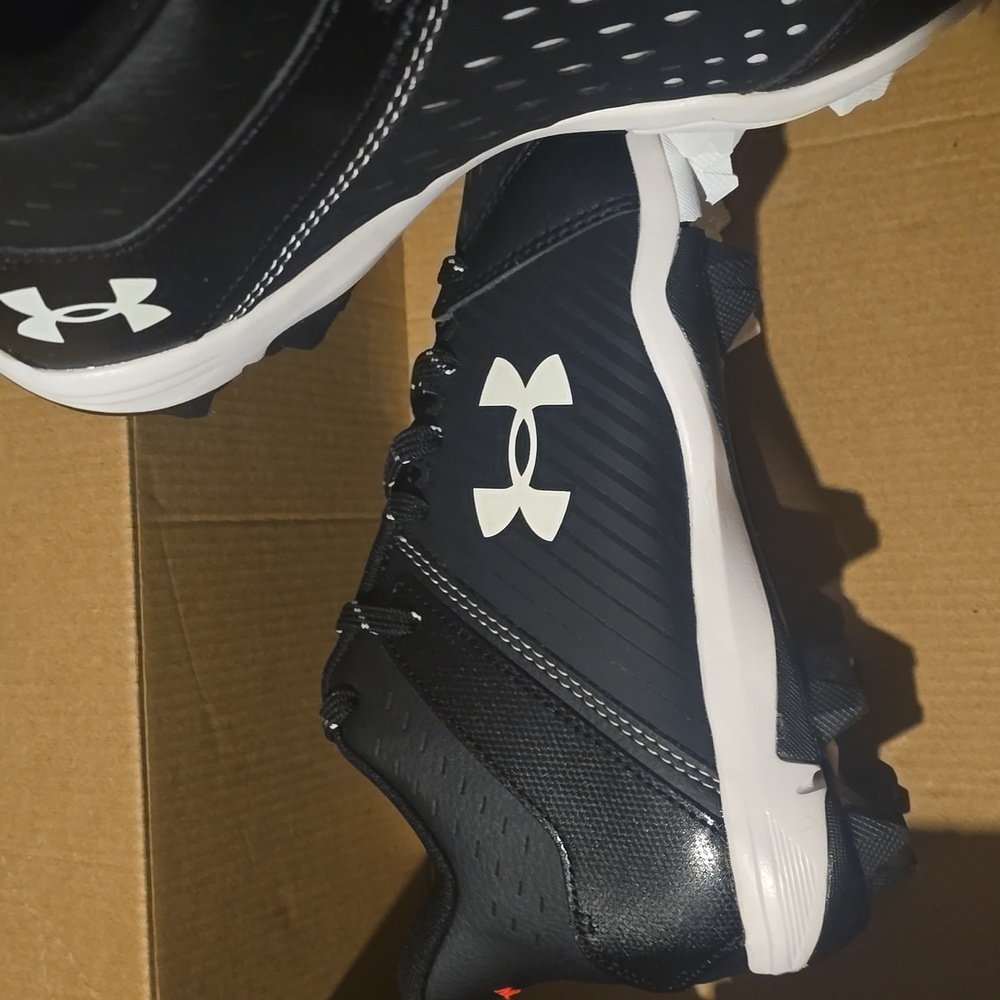 4.5Y Under Armour Kids Black and White Cleats